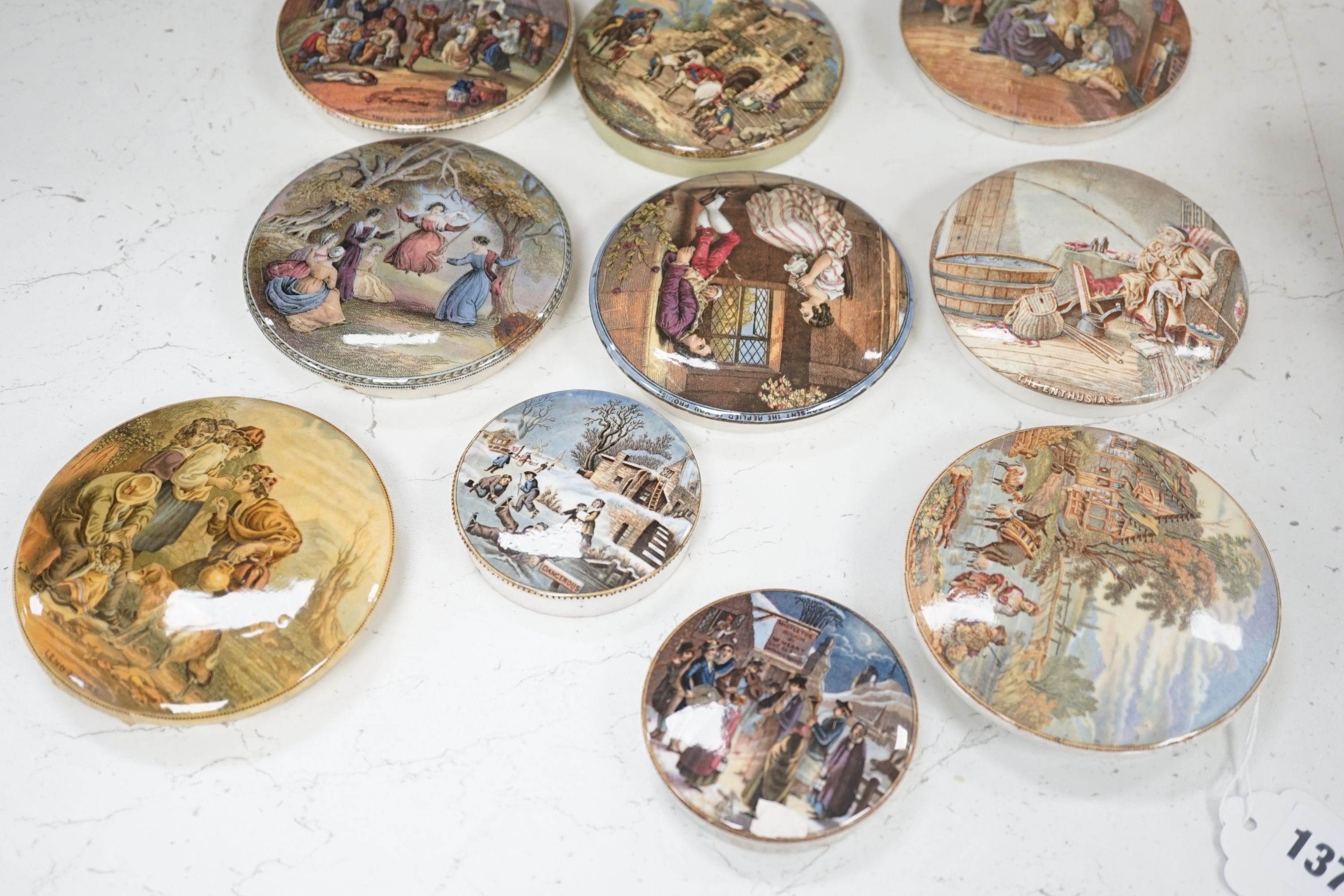 A collection of 20 Victorian pot lids